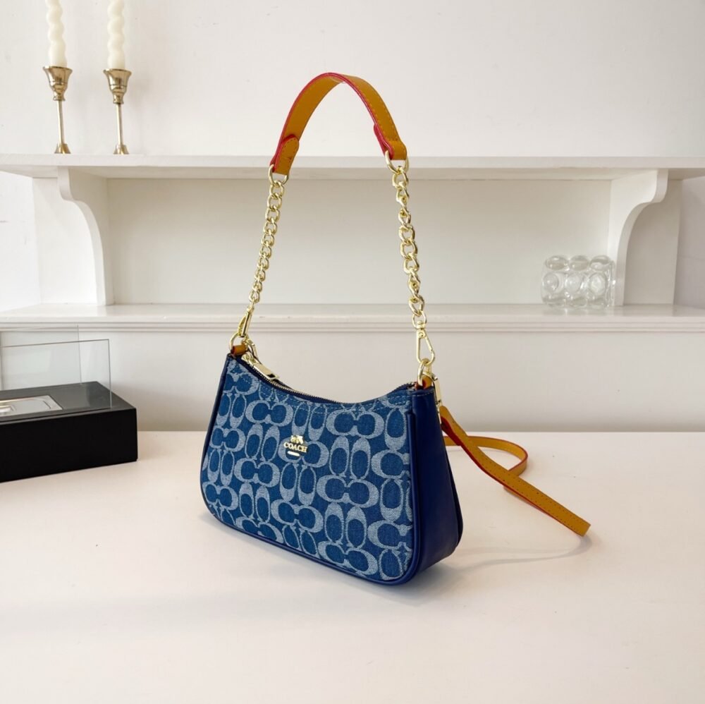 Coach jeans sling
